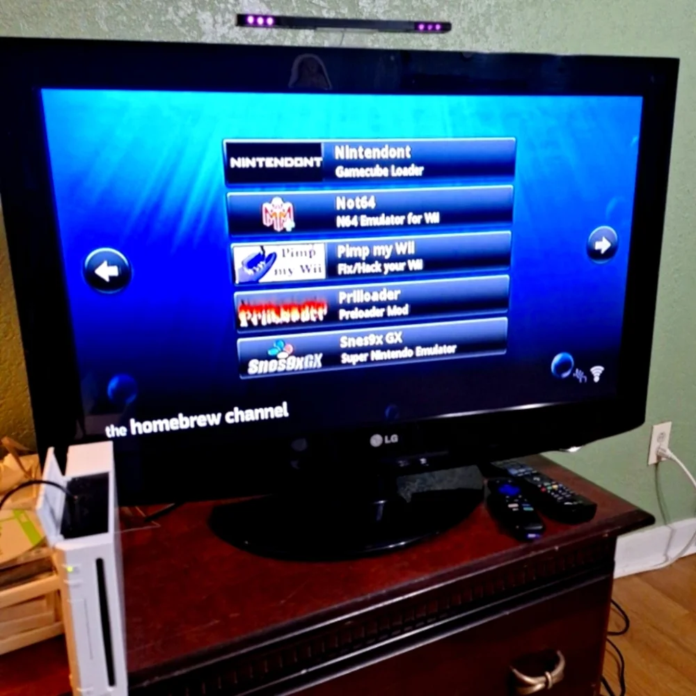 Nintendo Wii Console with White Console and Black TV Display